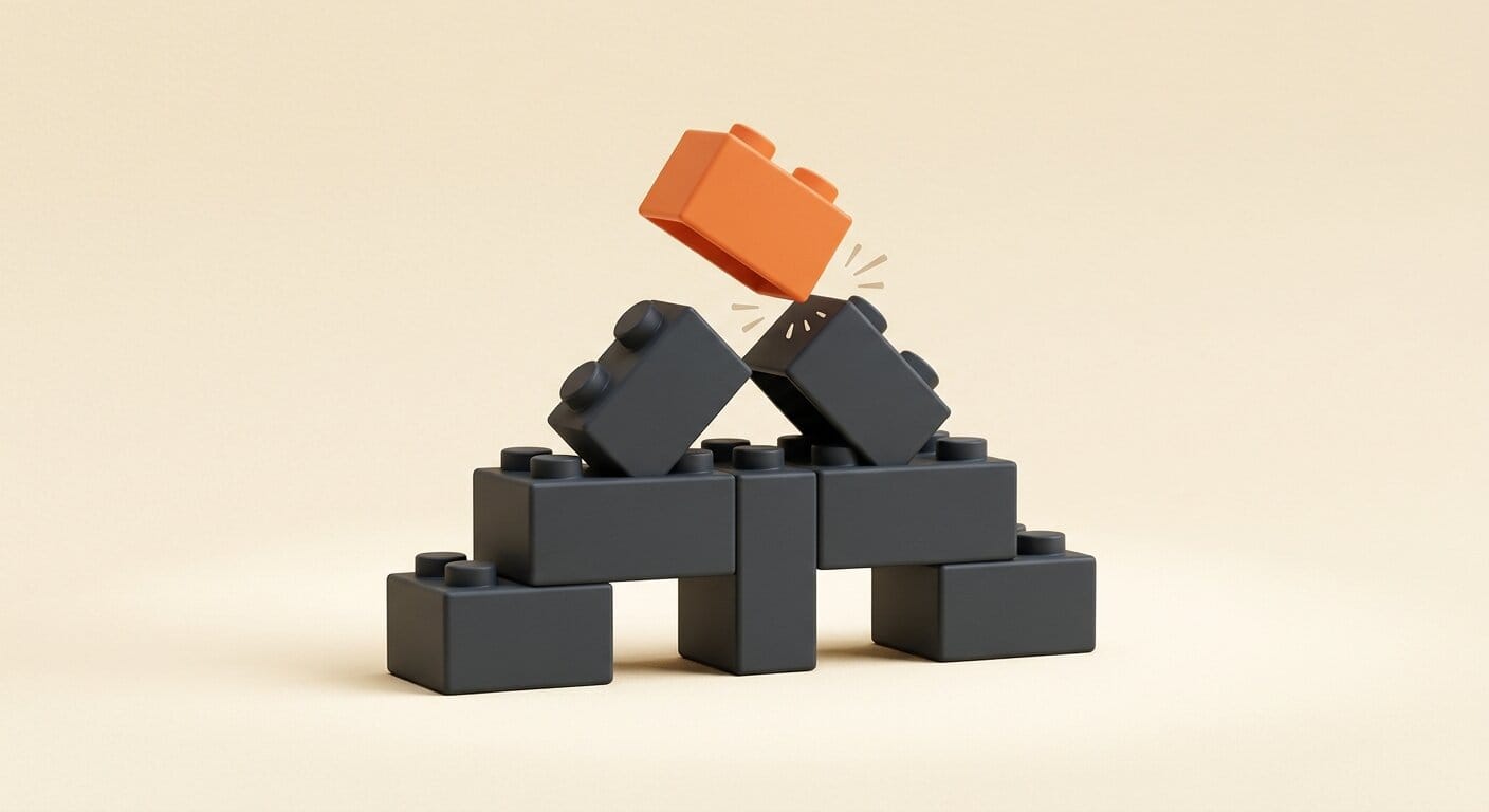 Charcoal building blocks assembling with one orange block snapping in